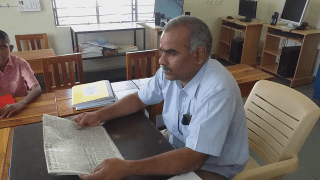 graphic பிரெயில் எழுதும் மாணவர்கள்